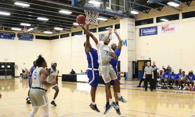 Juwan Malone goes up for a reverse lay up.  He finished with 14 points and 8 rebounds.